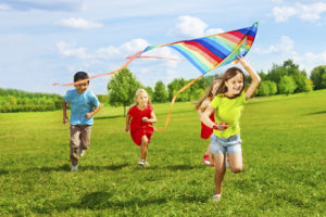 kids flying kite